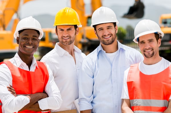Group of male construction workers at a building site